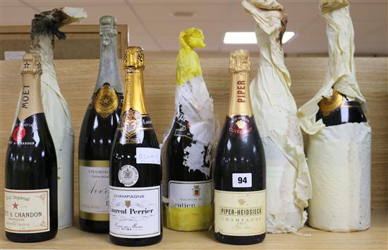 Seven bottles of assorted Champagnes including four magnumas of Averys Special Cuvee